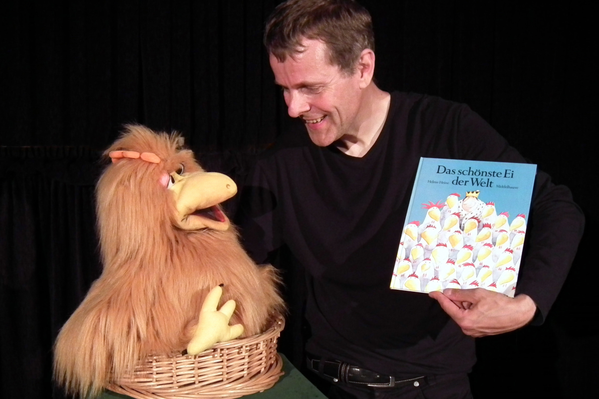 Handpuppe Huhn, Mann, Buch